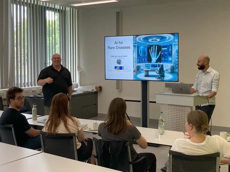Behnam Javanmardi with BCML Speaker Jan Hasenauer